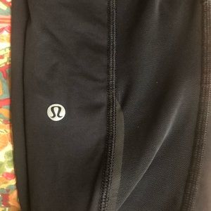 Lululemon cropped leggings with black mesh.